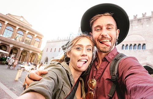 Man and Woman Sticking Tongues out